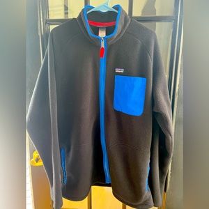 Patagonia Black Karstens Jacket w/Blue Pocket. Great condition. Worn twice.